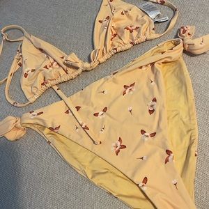 Weworewhat yellow bikini with red flower detail